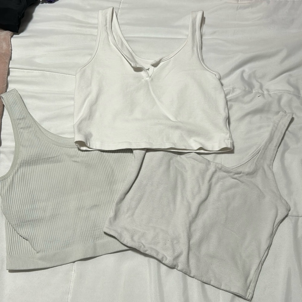 white tank top trio